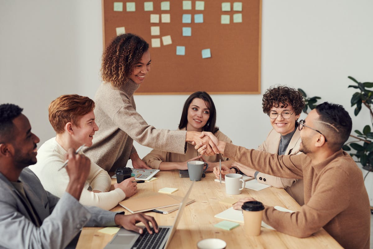 Business team discussing office equipment options