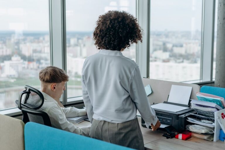 Business professional calculating copier lease early termination costs